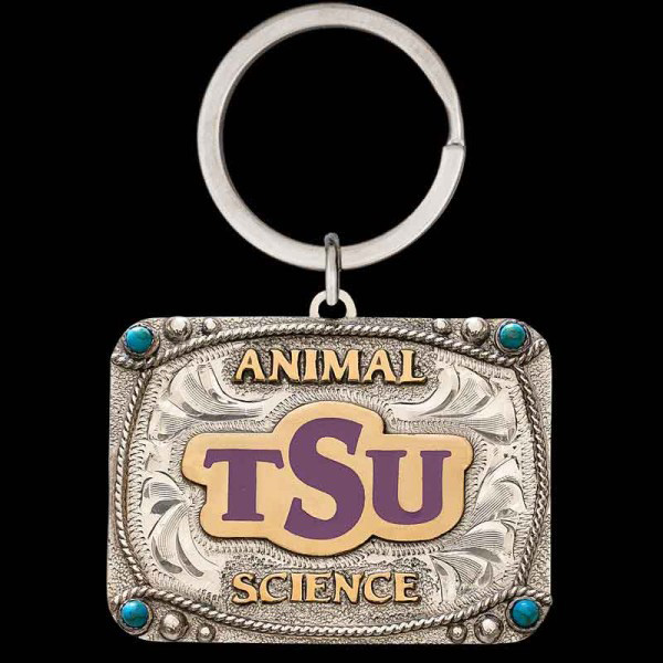 "Our True Grit Custom Keychain is expertly crafted with a hand-engraved German Silver base, featuring a traditional rope edge, Jeweler's Bronze lettering, and small cubic zirconia stones in each corner. Designed to be customizable, this keychain lets